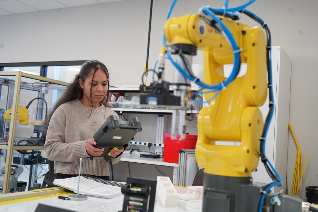 Naiya Salinas is one of a half-dozen students enrolled in the new AI Enhanced Robotic Manufacturing program at the Georgia Veterans Education Career Transition Resource (VECTR) Center, which is setting a new standard for technology-focused careers.